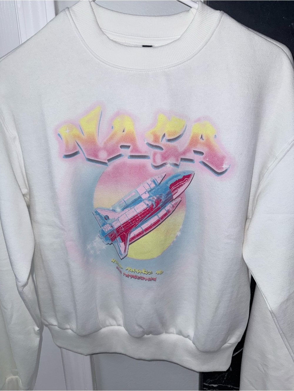 Divided White Crewneck Sweatshirt with Pastel Rocket Graphic